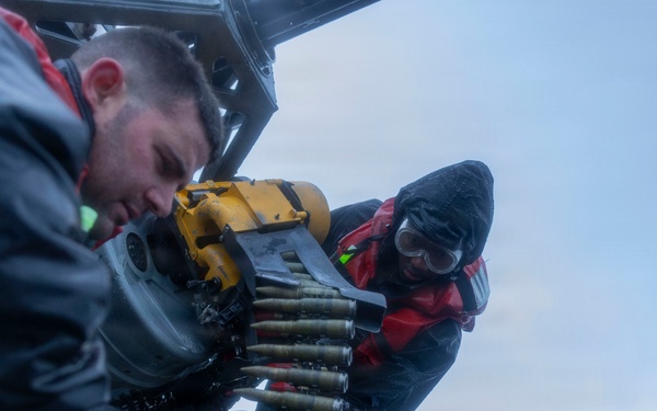 Sailors load ammunition aboard USS Bulkeley (DDG 84)