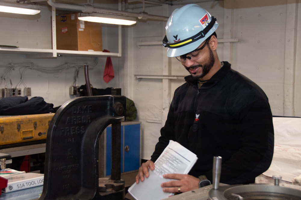 Ronald Reagan Sailors and Contractors Perform Maintenance