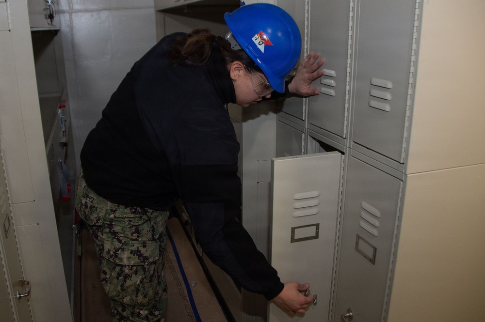 Ronald Reagan Sailors and Contractors Perform Maintenance