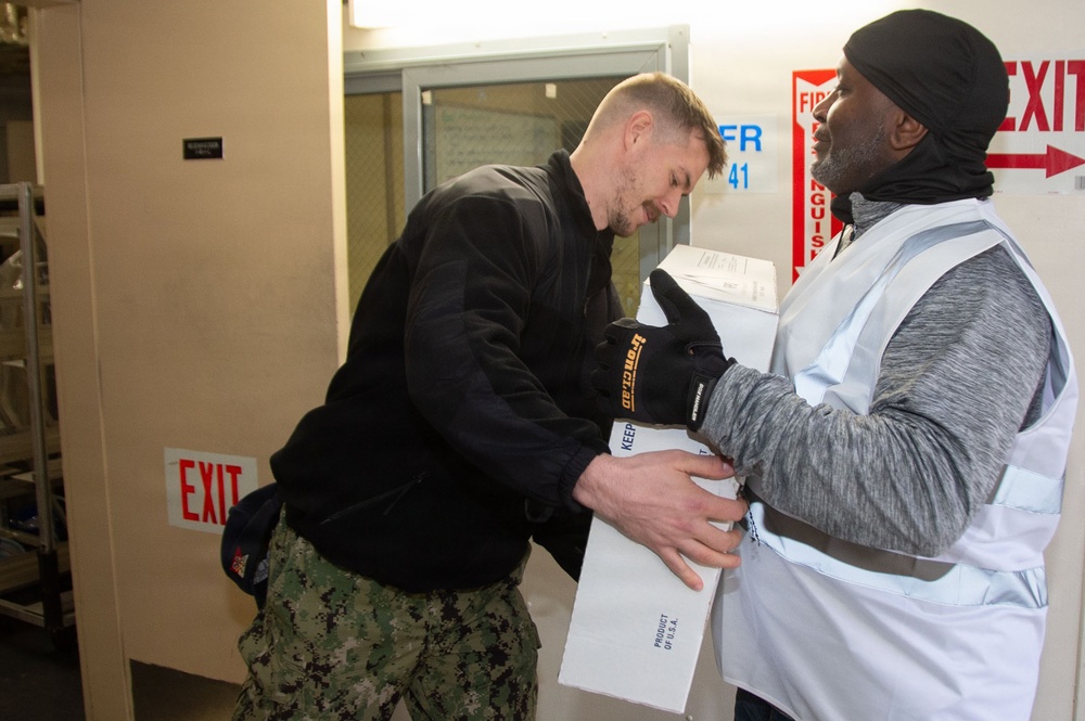 Ronald Reagan Sailors and Contractors Perform Maintenance