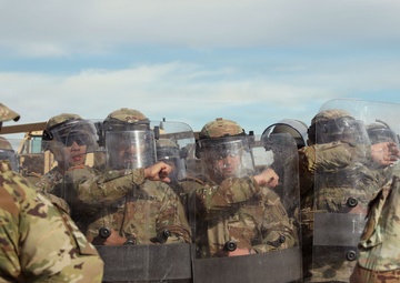 1-153rd Cavalry Regiment integrates UH-60L Black Hawks and LMTVs during QRF riot control training