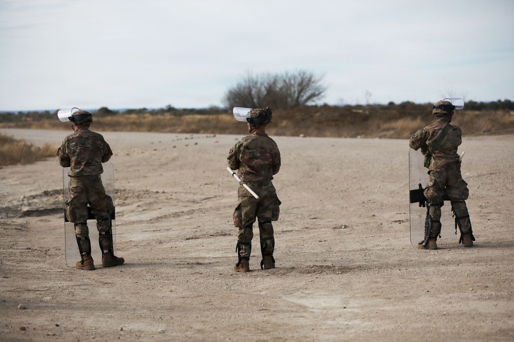 1-153rd Cavalry Regiment integrates UH-60L Black Hawks and LMTVs during QRF riot control training