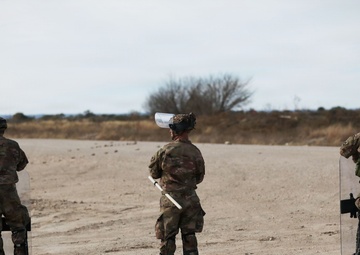 1-153rd Cavalry Regiment integrates UH-60L Black Hawks and LMTVs during QRF riot control training