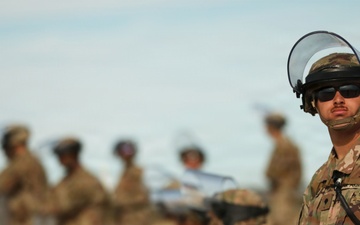 1-153rd Cavalry Regiment integrates UH-60L Black Hawks and LMTVs during QRF riot control training