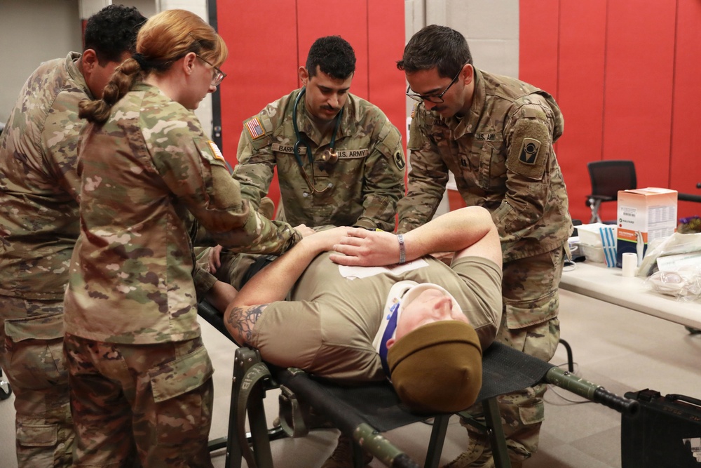 53rd Brigade Support Battalion conduct patient care during a mass casualty exercise supported by MEDEVAC