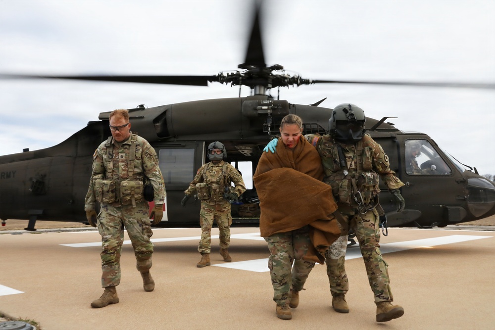 53rd Brigade Support Battalion conduct patient care during a mass casualty exercise supported by MEDEVAC