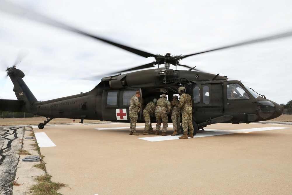 53rd Brigade Support Battalion conduct patient care during a mass casualty exercise supported by MEDEVAC
