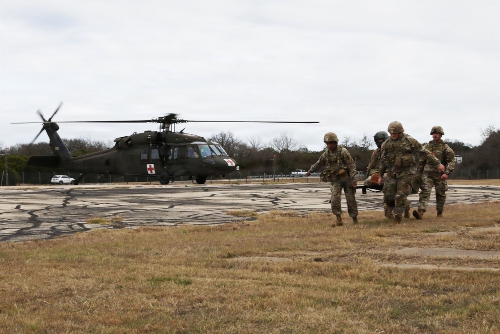 53rd Brigade Support Battalion conduct patient care during a mass casualty exercise supported by MEDEVAC