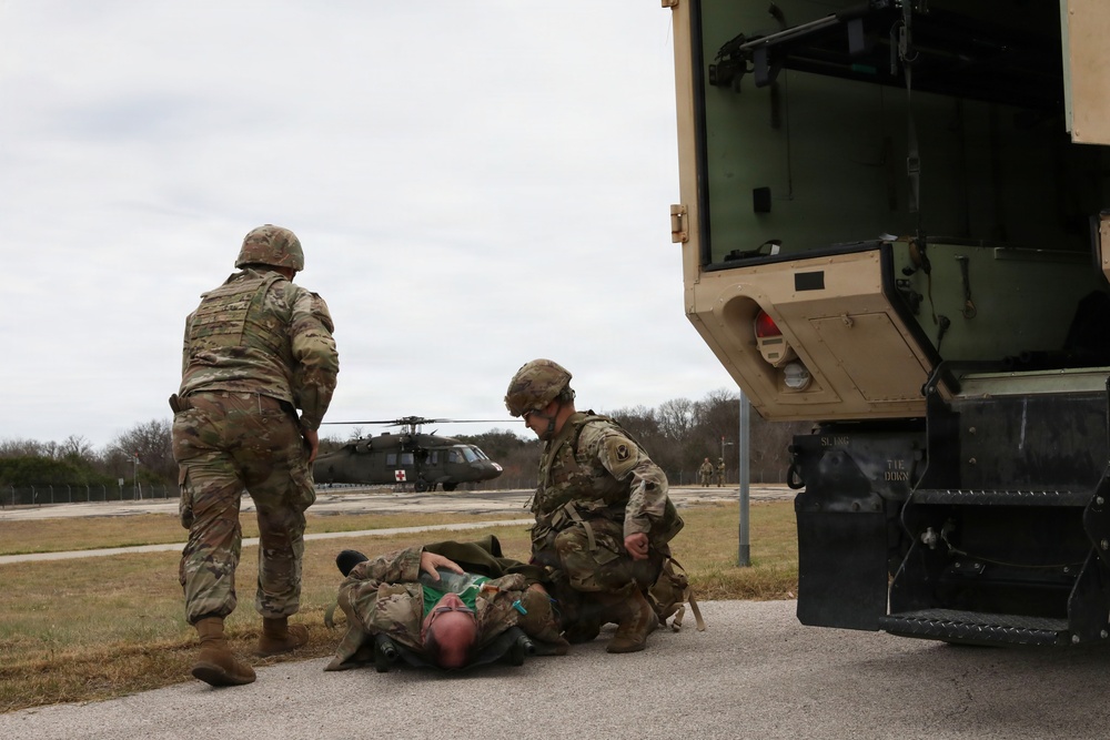 53rd Brigade Support Battalion conduct patient care during a mass casualty exercise supported by MEDEVAC
