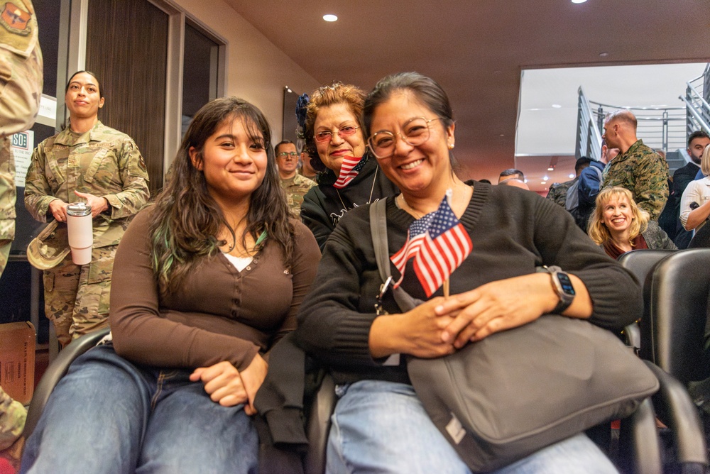 Secretary of War Pete Hegseth gives the oath of enlistment to Coast Guard and other military recruits in Southern California