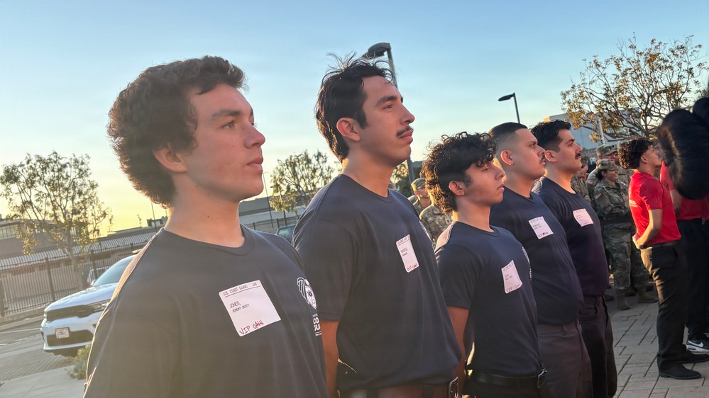 Secretary of War Pete Hegseth administers the oath of enlistment to Coast Guard and other military recruits in Southern California