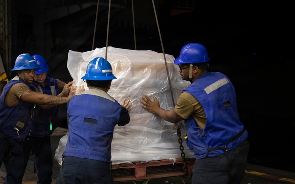 Abraham Lincoln conducts replenishment-at-sea with Yukon