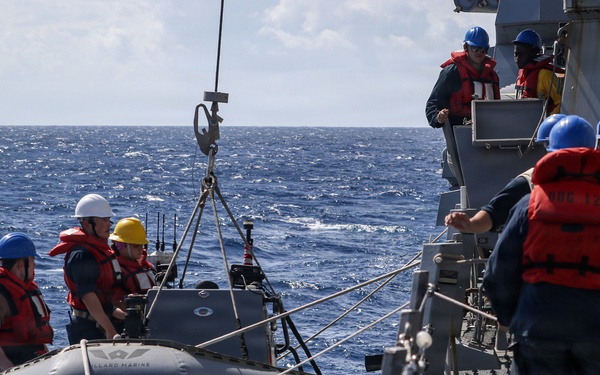 Frank E. Petersen Jr. conducts small boat operations