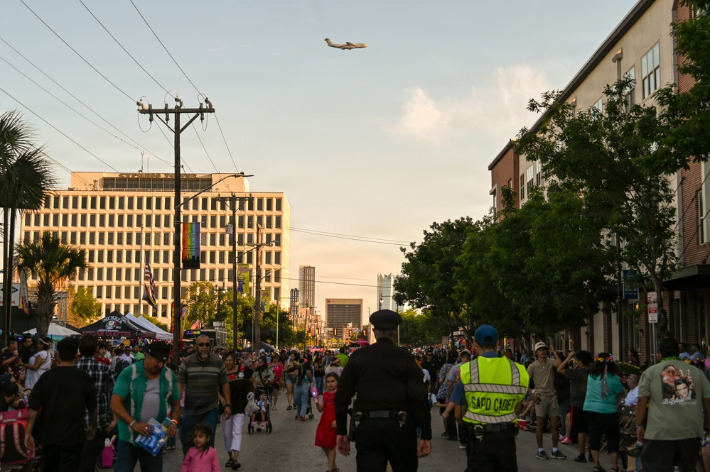 Alamo Wing C-5M Super Galaxy Opens Fiesta Flambeau Parade with Sky-High Salute