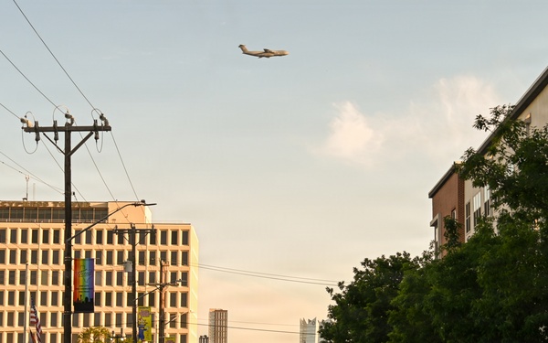 Alamo Wing C-5M Super Galaxy Opens Fiesta Flambeau Parade with Sky-High Salute
