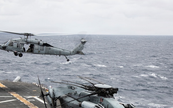 USS Tripoli Conducts Flight Operation with HSC 25