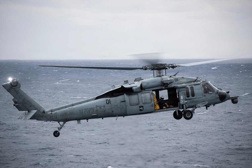 USS Tripoli Conducts Flight Operation with HSC 25