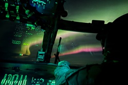 Alaska Army National Guardsmen conduct a nighttime medical evacuation