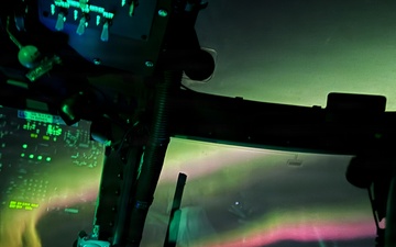 Alaska Army National Guardsmen conduct a nighttime medical evacuation mission