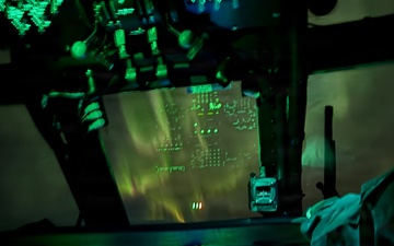 Alaska Army National Guardsmen conduct a nighttime medical evacuation mission