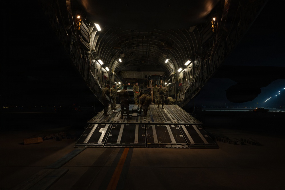 Airmen prepare cargo for transport in support of AFCENT exercise