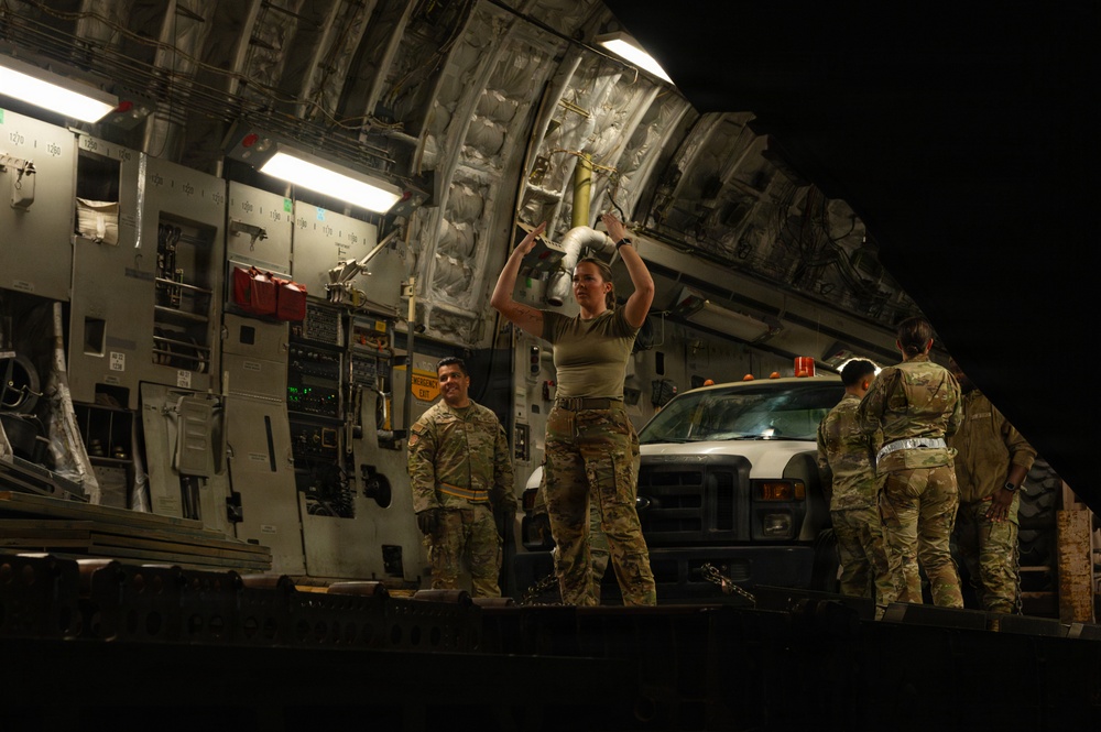 Airmen prepare cargo for transport in support of AFCENT exercise