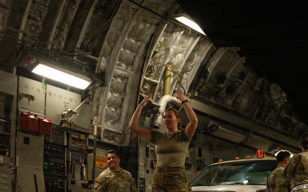Airmen prepare cargo for transport in support of AFCENT exercise