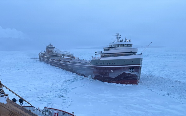 Coast Guard Cutter Mackinaw (WLBB 30) frees vessel from ice on Lake Huron
