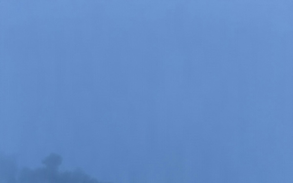 Coast Guard Cutter Mackinaw (WLBB 30) frees vessel from ice on Lake Huron