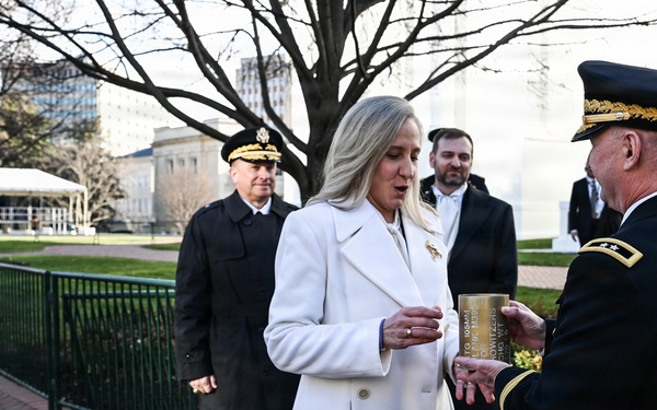 AG presents casing from 19-gun salute to Gov. Spanberger