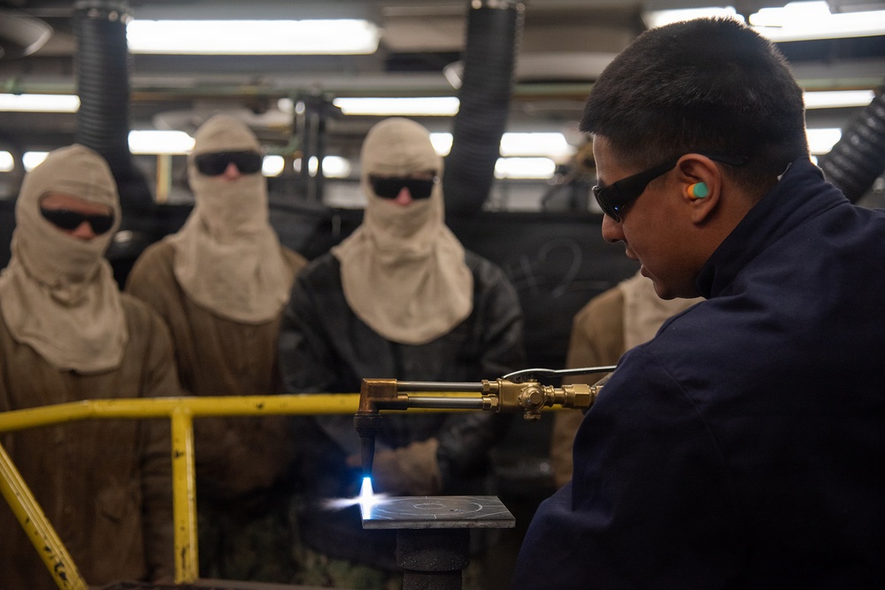 Surface Warfare Engineering School Command (SWESC) Great Lakes Instructors Train Next Generation of Naval Hull Maintenance Technicians