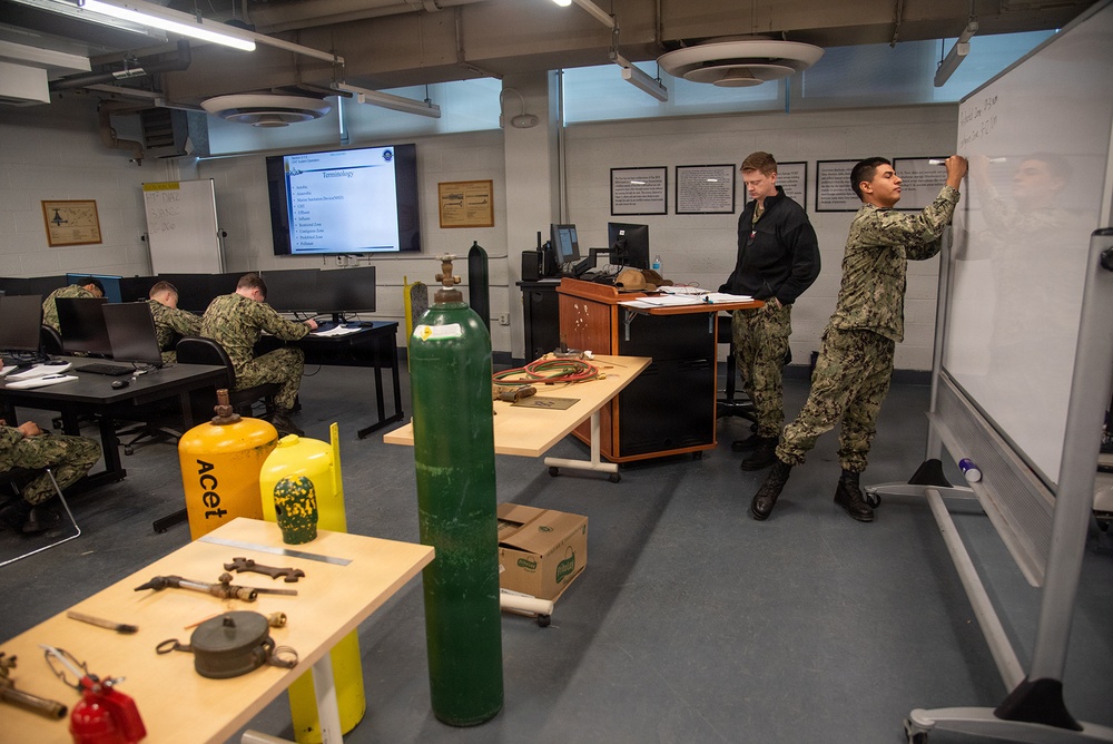 Surface Warfare Engineering School Command (SWESC) Great Lakes Instructors Train Next Generation of Naval Hull Maintenance Technicians