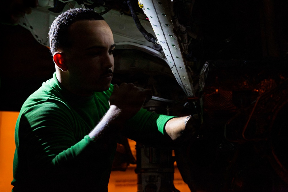 Abraham Lincoln conducts routine aircraft maintenance