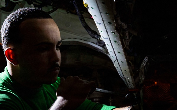 Abraham Lincoln conducts routine aircraft maintenance