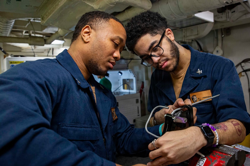 Abraham Lincoln conducts routine aircraft maintenance