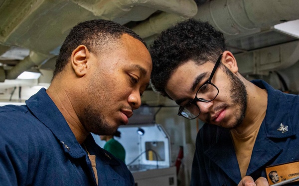 Abraham Lincoln conducts routine aircraft maintenance