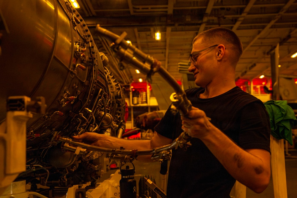 Abraham Lincoln conducts routine aircraft maintenance