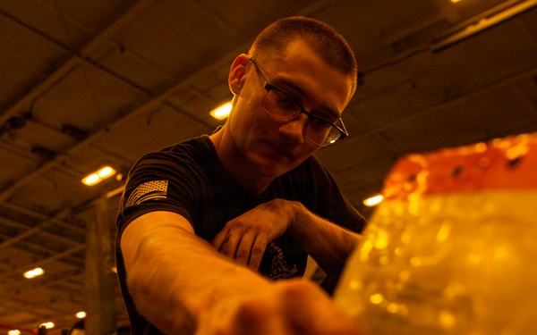 Abraham Lincoln conducts routine aircraft maintenance