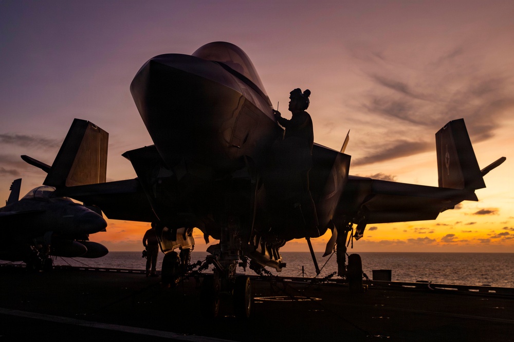 Abraham Lincoln conducts routine aircraft maintenance