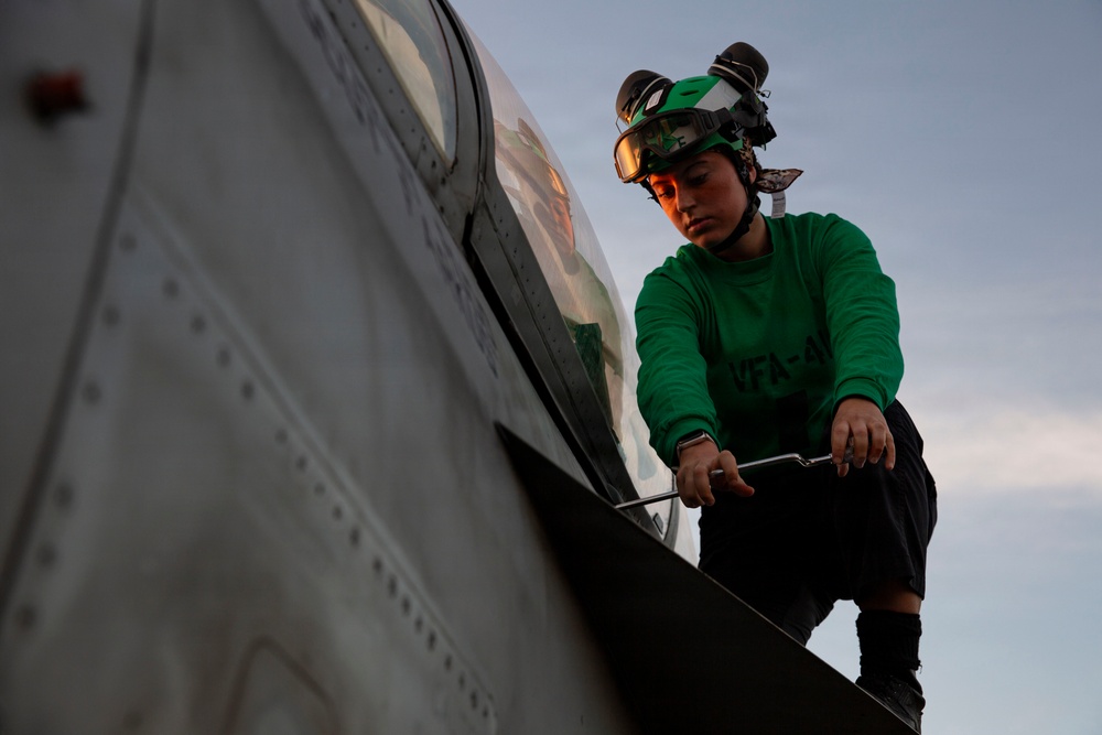 Abraham Lincoln conducts routine aircraft maintenance