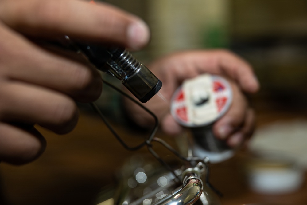 III MEF Band’s Sole Fixer