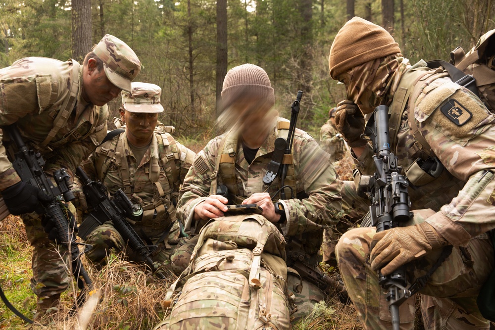 1st Special Forces Group (Airborne) Green Berets instruct medics on basic infantry tactics