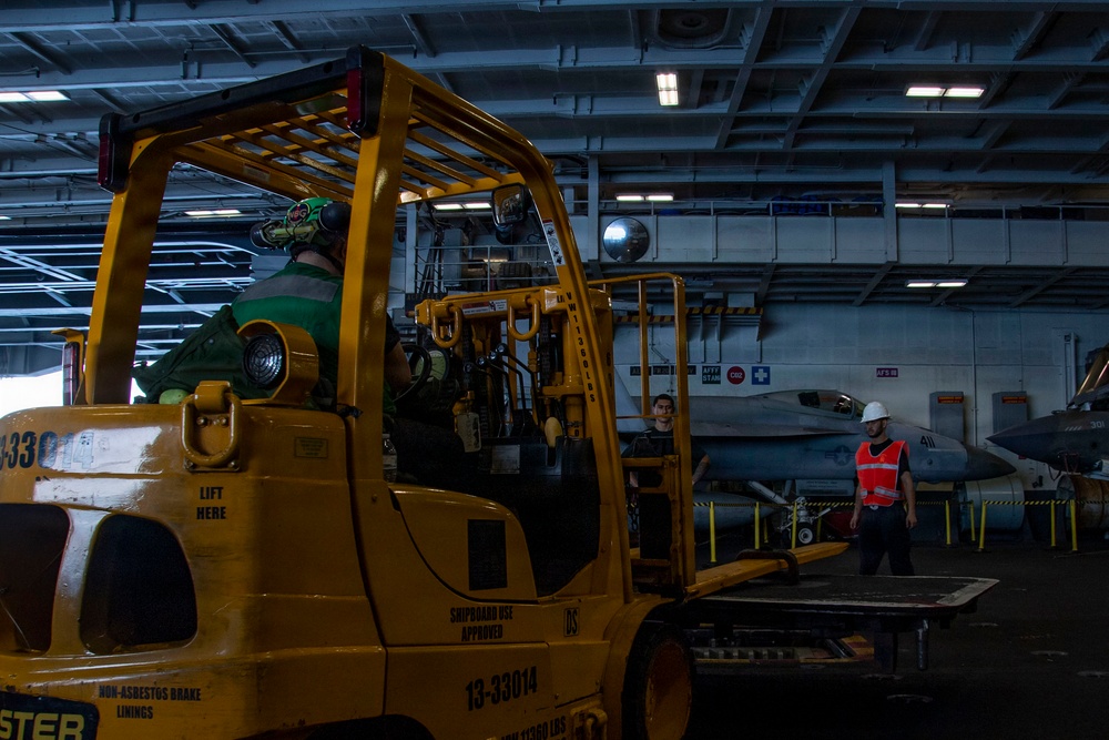 Abraham Lincoln conducts a replenishment-at-sea with Henry J. Kaiser