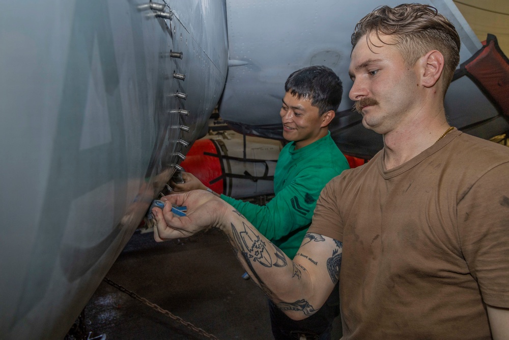 Abraham Lincoln conducts routine aircraft maintenance