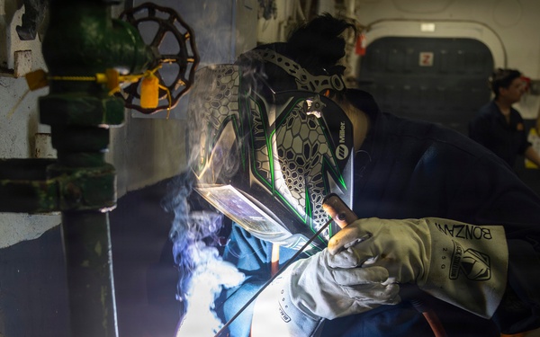 Abraham Lincoln conducts routine maintenance