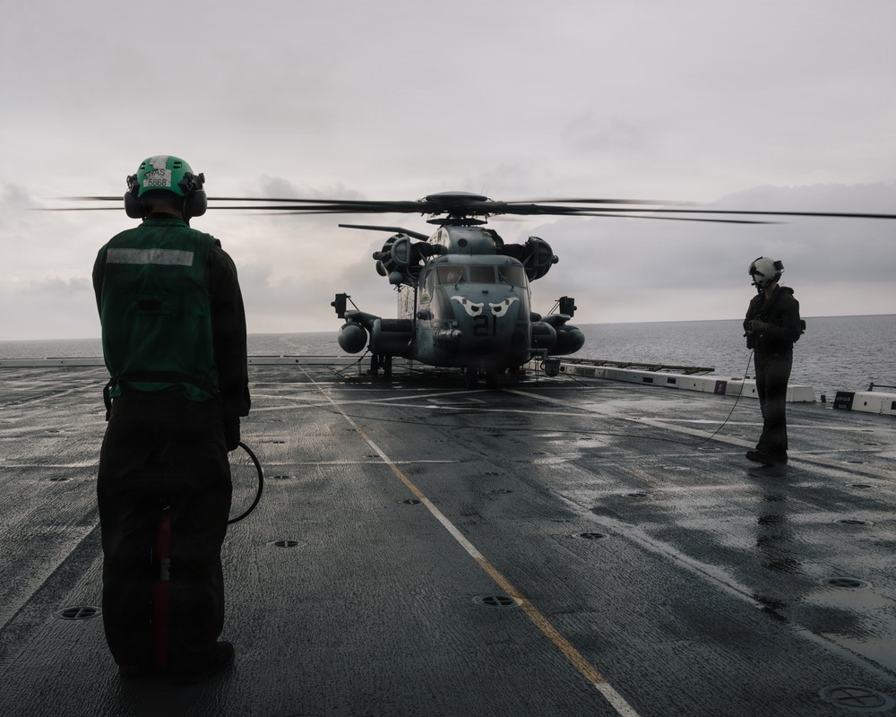 11th MEU Marines and Sailors conduct flight deck operations aboard USS Portland