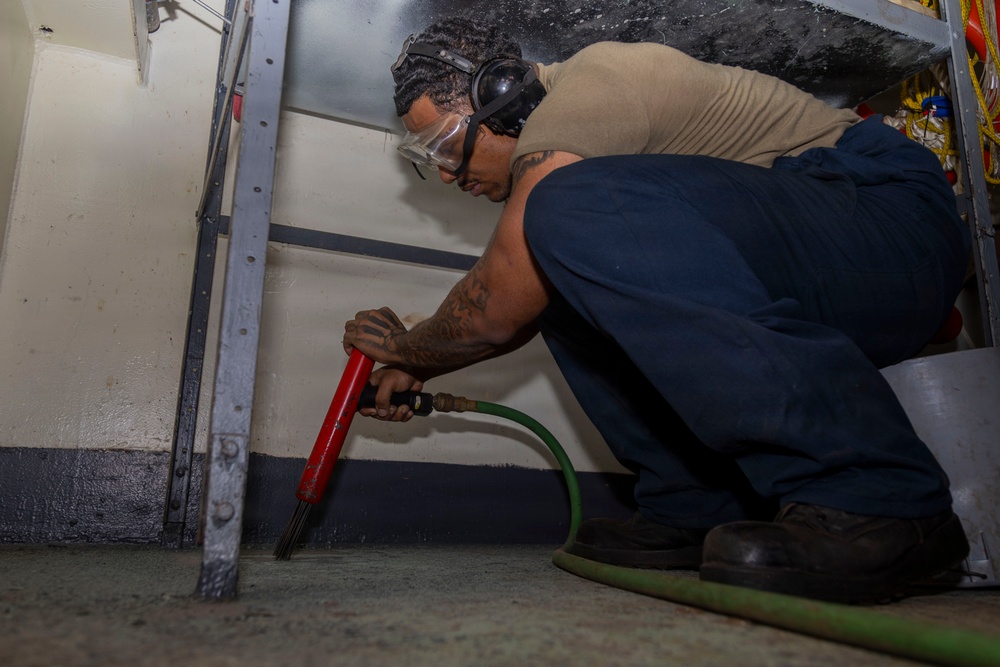 Abraham Lincoln conducts routine maintenance