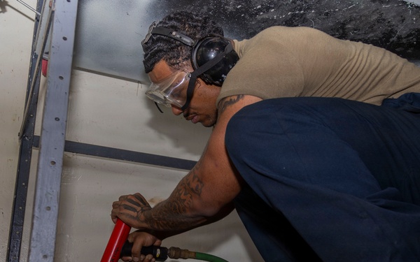 Abraham Lincoln conducts routine maintenance