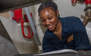 Abraham Lincoln conducts routine maintenance