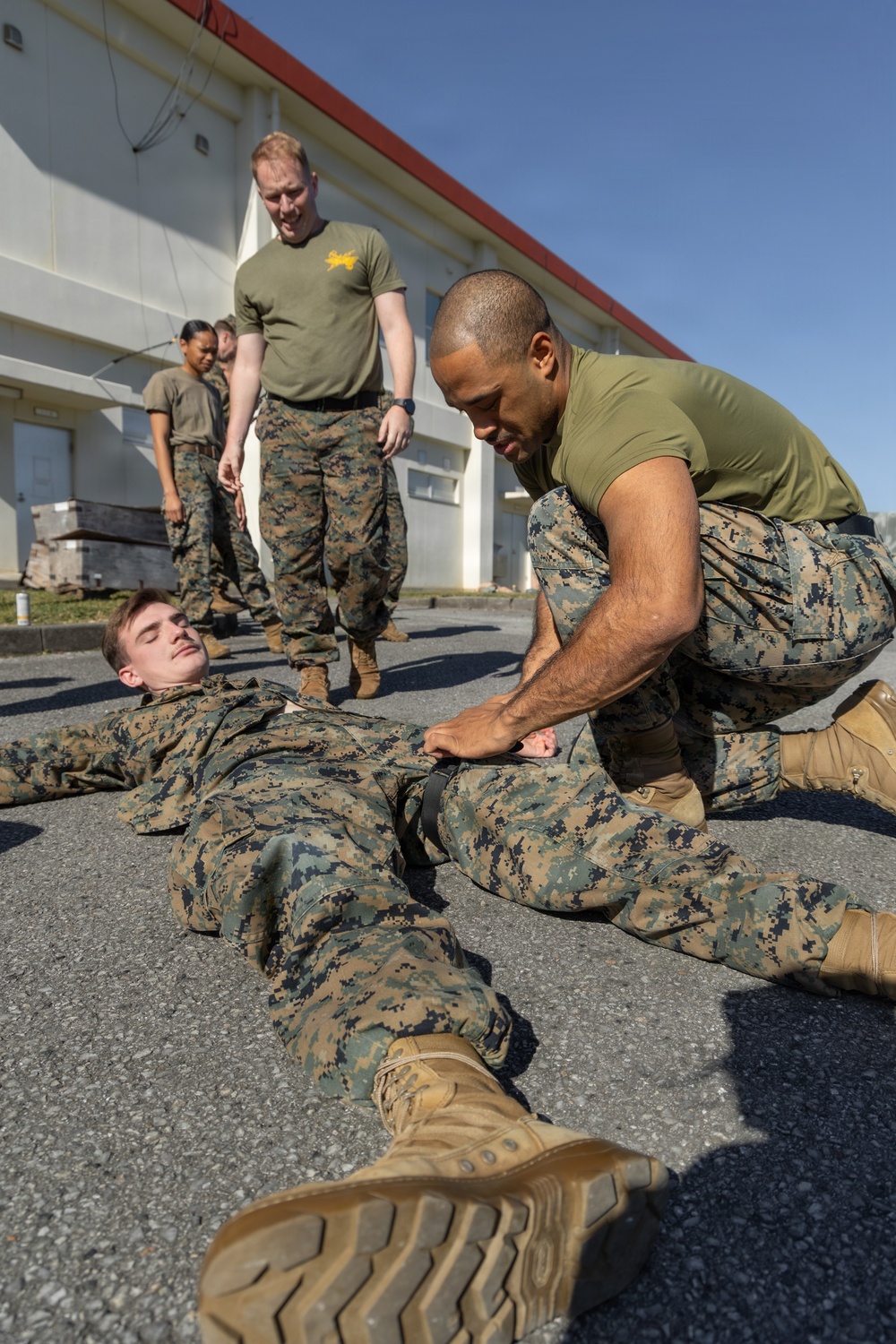 5th Air Naval Gunfire Liaison Company Marines conduct tactical combat casualty care training